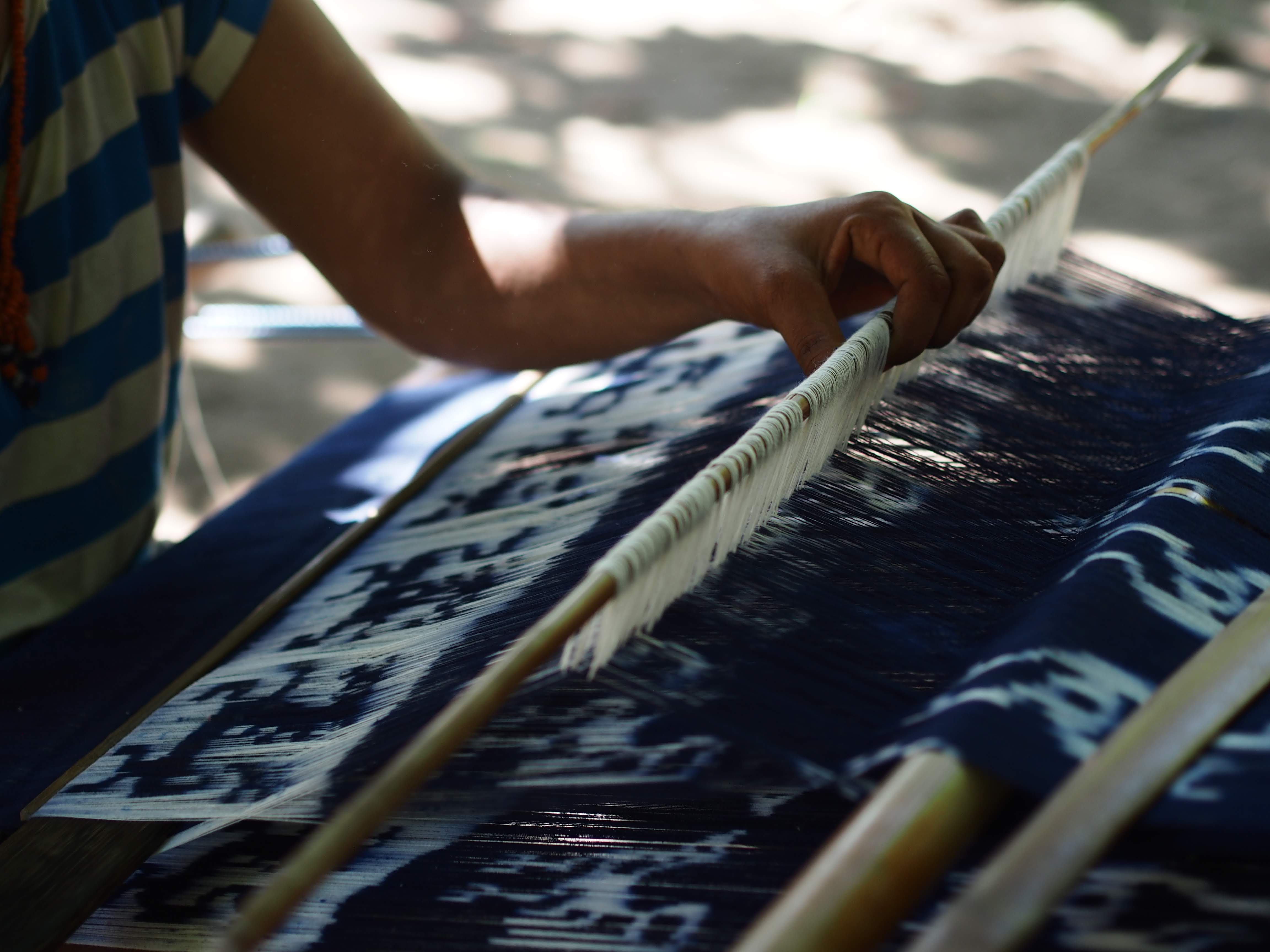 A Sumba artisan weaving ikat